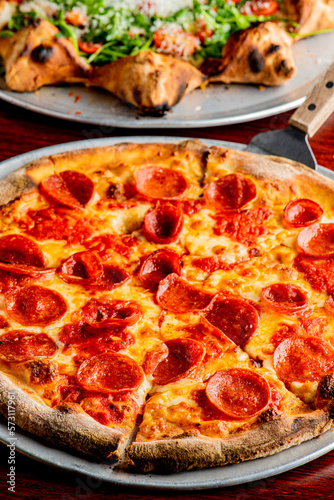 Pizza. Cheese Pizza. Traditional New York City style margarita pizza pie with a thin homemade crispy crust, tomato, garlic, marinara sauce topped with buffalo mozzarella cheese and fresh basil leaves.