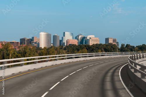Empty urban asphalt road exterior with city buildings background. New modern highway concrete construction. Concept way to success. Transportation logistic industry fast delivery. Arlington. USA. © VideoFlow