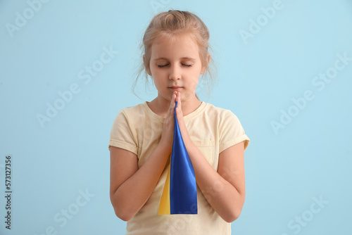 Little girl with flag of Uk...