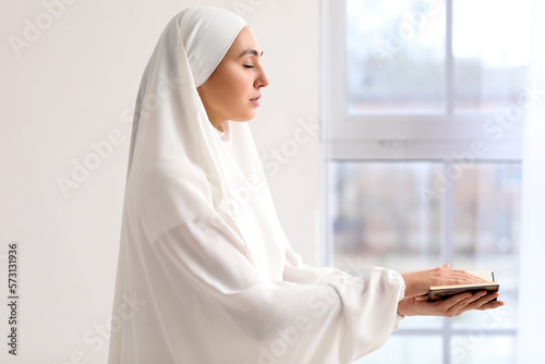 Muslim woman in white hijab...