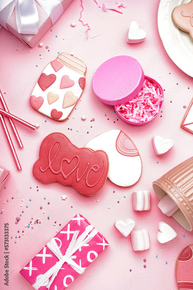 Composition with tasty cookies, gifts, marshmallows and straws on pink background. Valentine's Day celebration Composition with tasty cookies, gifts, marshmallows and straws on pink background. Valentine's Day celebration