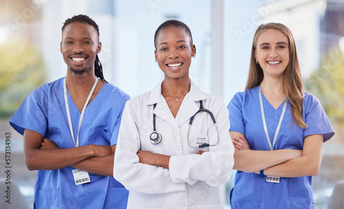 Doctors team, arms crossed and portrait at hospital with teamwork, diversity and solidarity for healthcare. Nurse, black man and women leader for student internship, and collaboration for wellness