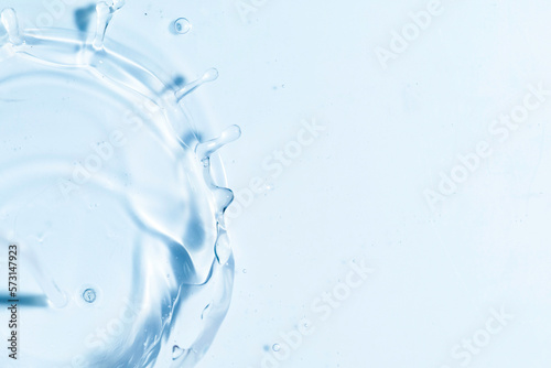 Close-up of fresh and transparent splashes of water or lotion, micellar in the form of a crown photo