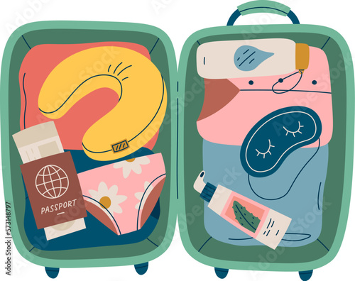 Open suitcase full of clothes flat icon