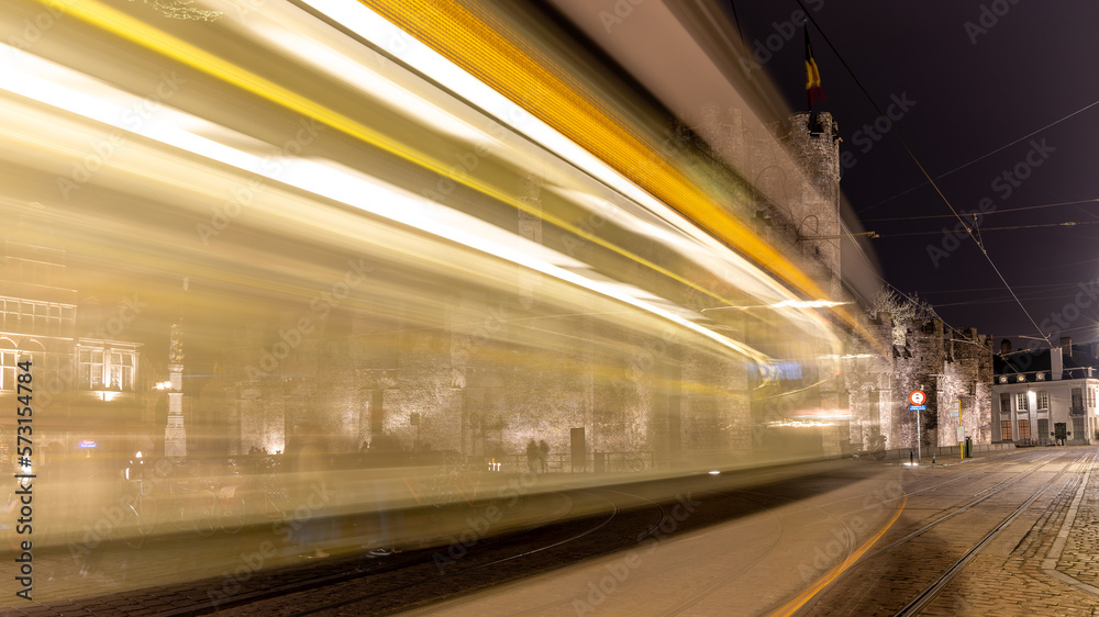 Tramway lightrays near medieval castle in Gent, Belgium in January 2023