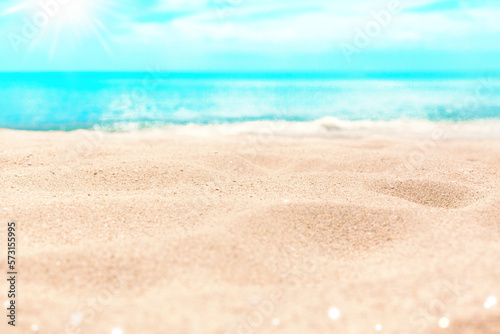Tropical island beach nature blurred bokeh background, yellow sand, blue sea water, turquoise ocean, sunny sky white clouds, summer holidays template, vacation concept, travel banner, empty copy space