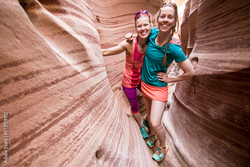 Portrait of two female canyoneers in Zebra Canyon, Grand Staircase-Escalante National Monument, Utah, USA photo