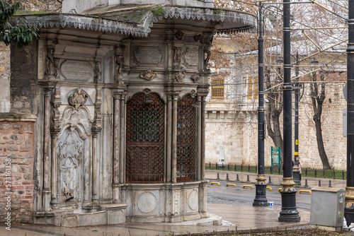 A pavilion on a street corner next to Zeynep Sultan Mosque. photo