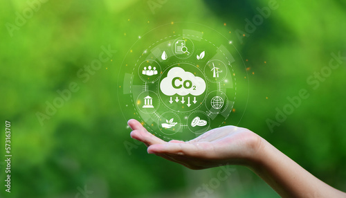Reduce CO2 emission concept in the hand for environmental,