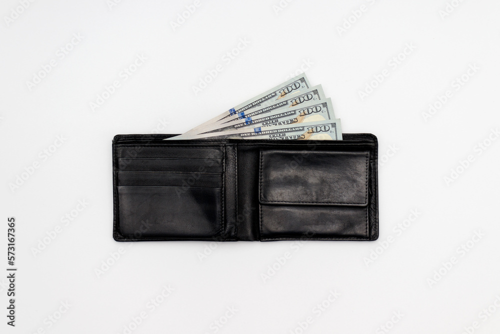Dollar and wallet. Wallet with hundred dollar bills sticking out on white background. Dollar and wallet. Wallet with hundred dollar bills sticking out on white background.