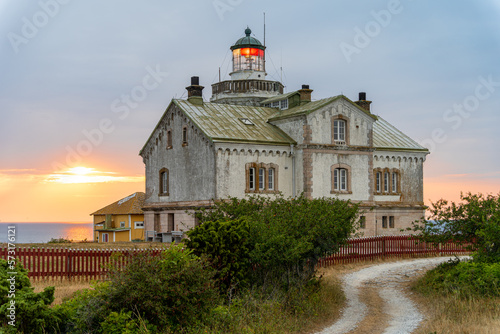 Photography Stone lighthouse building in summer afternoon sun on Stora Karlso
