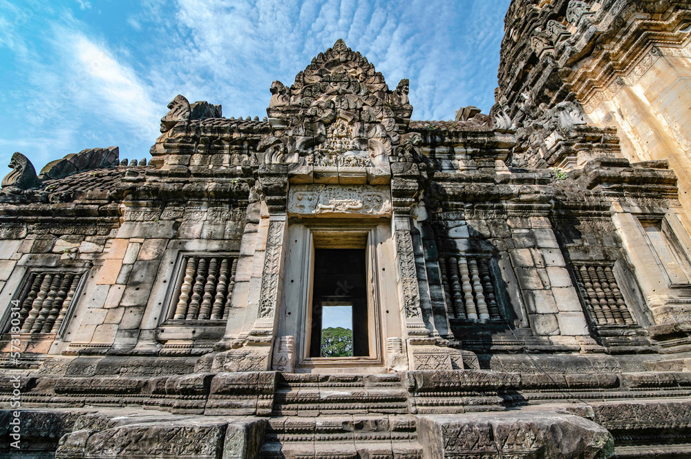 The doorway leads into the Phimai Ancient Khmer Prasat, the principal Buddha image in the east, Nakhon Ratchasima, Thailand.