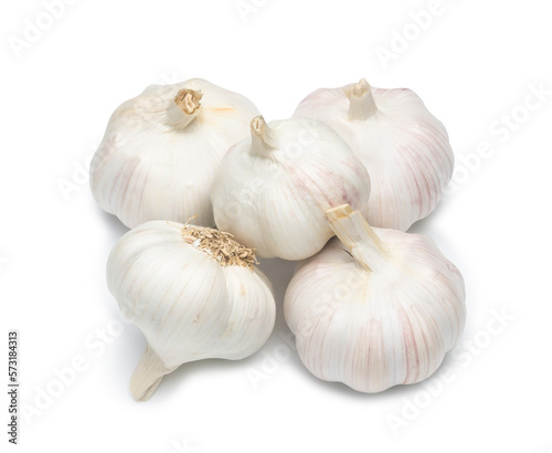 Top view of four fresh white garlic bulbs in stack isolated on white background with clipping path, Thai herb is great for healing several severe diseases, heart attack