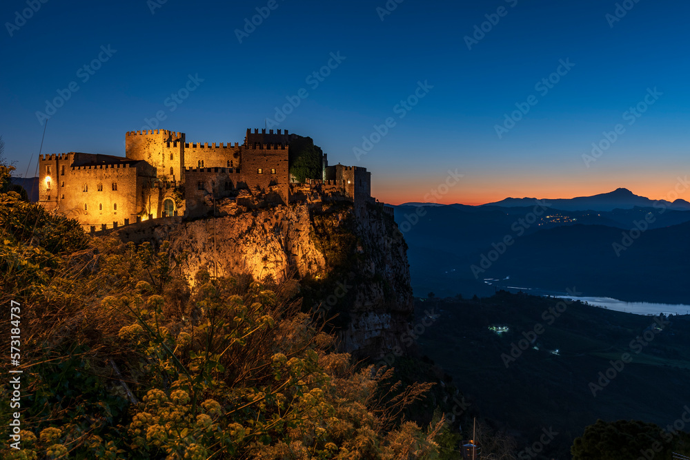 Panoramic view of Caccamo castle at nightfall, province of Palermo IT