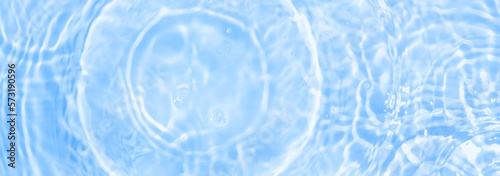 Water panoramic banner background. Water texture, water surface with rings and ripple. Spa concept background. Flat lay, top view, copy space, composition