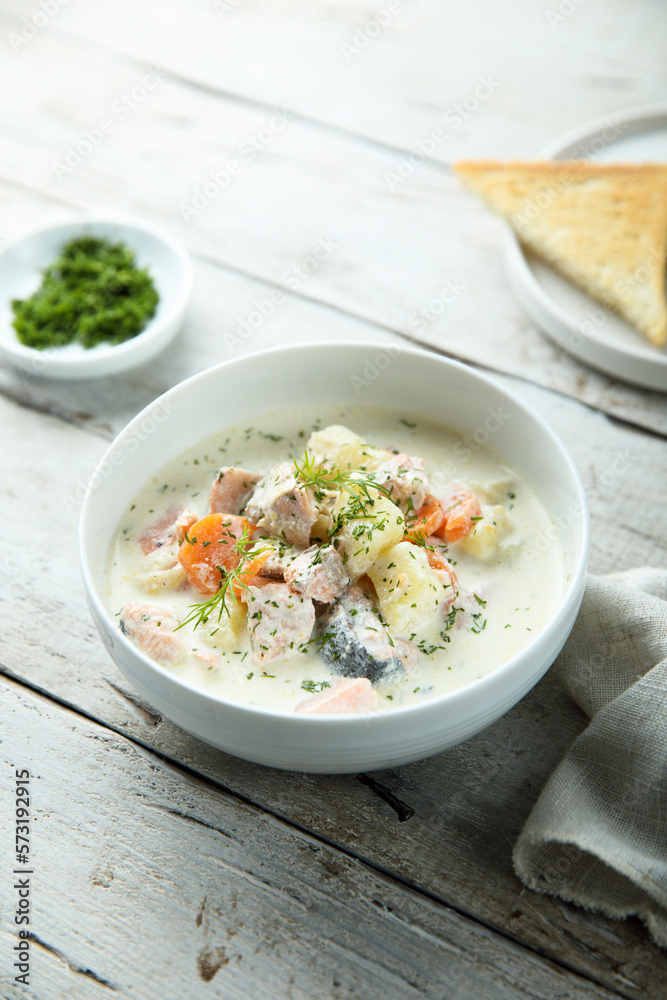 Traditional fish soup with vegetables and cream Traditional fish soup with vegetables and cream