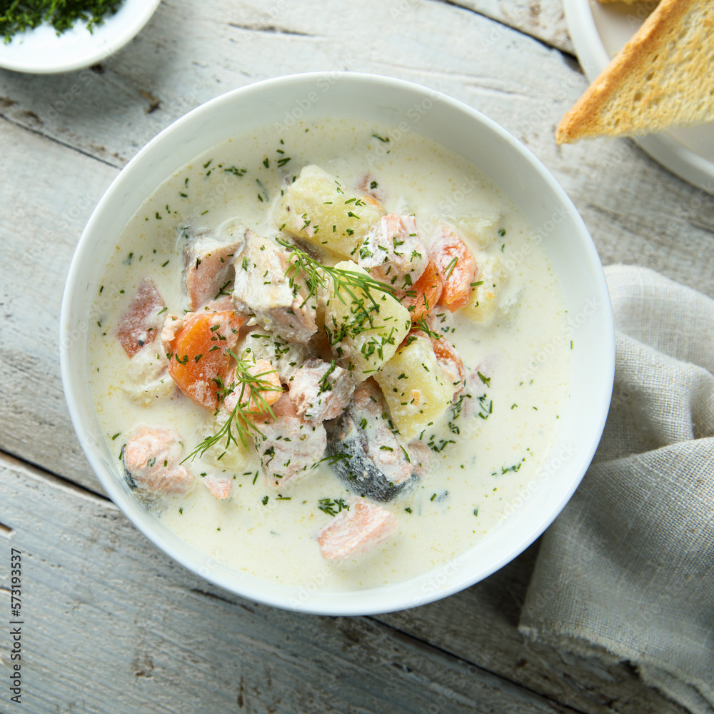 Traditional fish soup with vegetables and cream Traditional fish soup with vegetables and cream