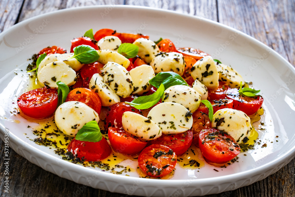 Caprese salad on wooden board
Caprese salad on wooden board