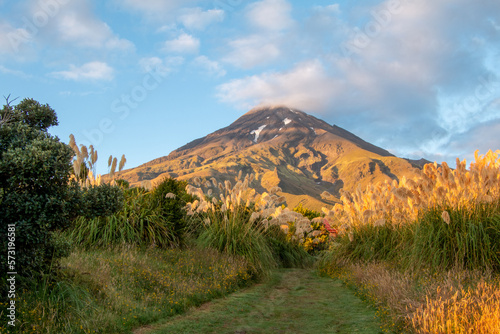 Mt Taranaki in Egmont National Park, New Zealand, in evening light, viewed from the Egmont Visitor Centre
