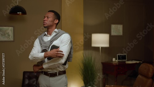 A dark-skinned African-American guy is preparing for a session to discuss mental problems during psychotherapy