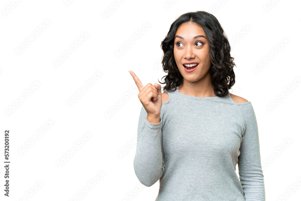 Young Argentinian woman over isolated background intending to realizes the solution while lifting a finger up Young Argentinian woman over isolated background intending to realizes the solution while lifting a finger up