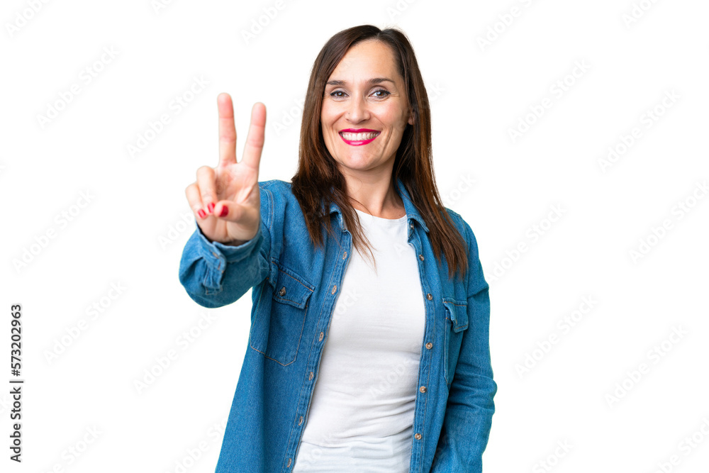 Middle age woman over isolated chroma key background smiling and showing victory sign Middle age woman over isolated chroma key background smiling and showing victory sign