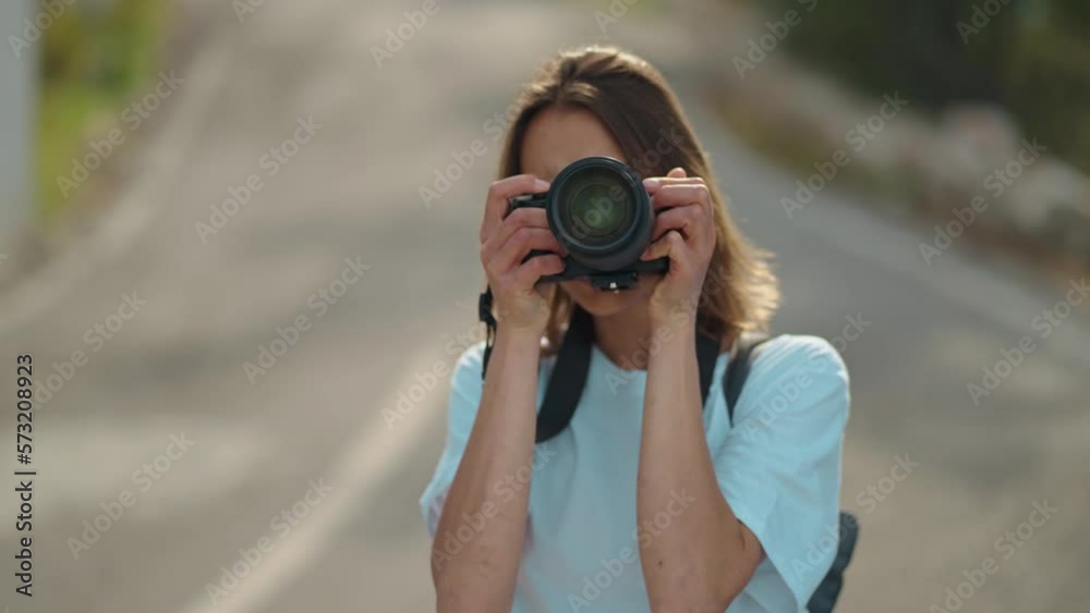 pretty woman travel blogger taking photo or video on professional camera, viewpoint among mountains and blue sky, cableway on background. viewpoint of Tunektepe Teleferik, Antalya, Turkey pretty woman travel blogger taking photo or video on professional camera, viewpoint among mountains and blue sky, cableway on background. viewpoint of Tunektepe Teleferik, Antalya, Turkey