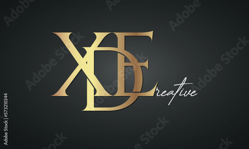 luxury letters XDE golden logo icon premium monogram, creative royal logo design photo