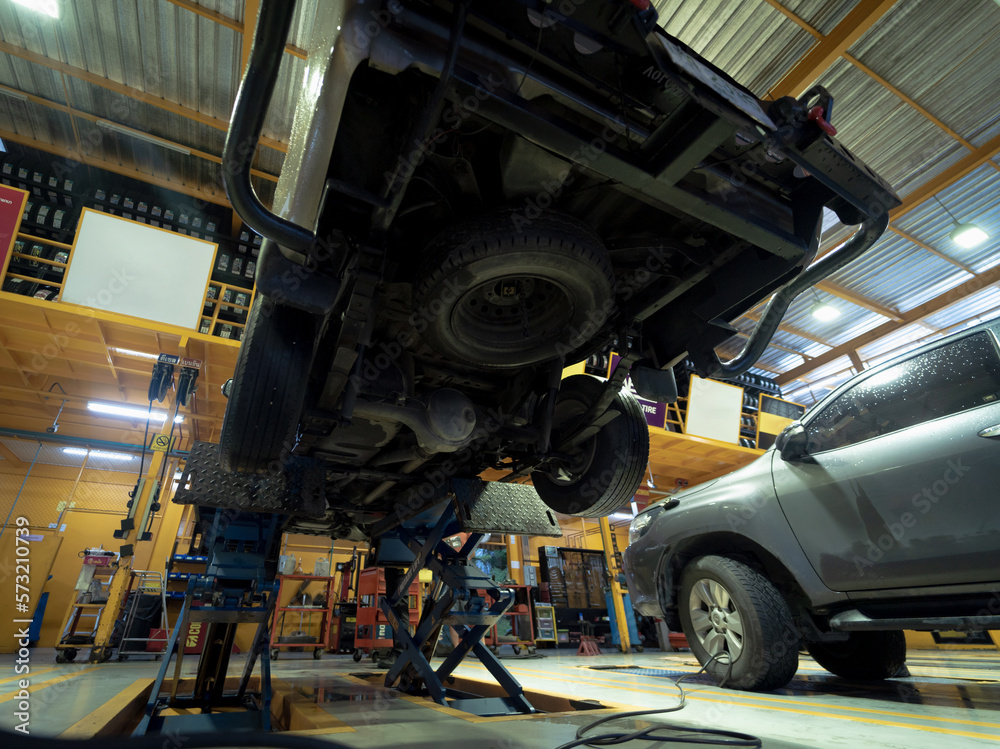 custom made wallpaper toronto digitalCar on hydraulic lift in auto repair shop