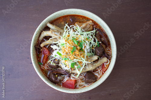 Thai rice vermicelli with spicy sauce. traditional northern Thai rice noodle and fresh vegetable, Top view.