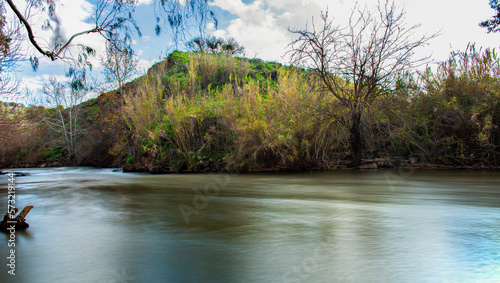 Obraz na płótnie Jordan river stream clear blue sky w salonie