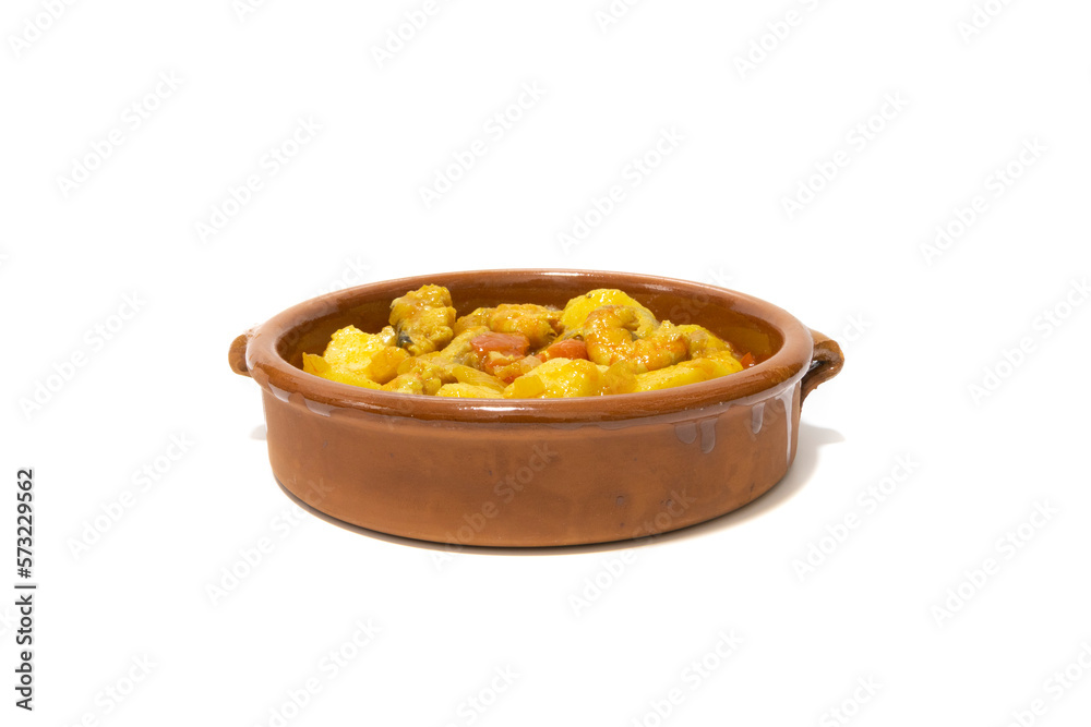 Potato stew with cod, served in a clay bowl. Isolated on white background. Spanish food concept. Potato stew with cod, served in a clay bowl. Isolated on white background. Spanish food concept.