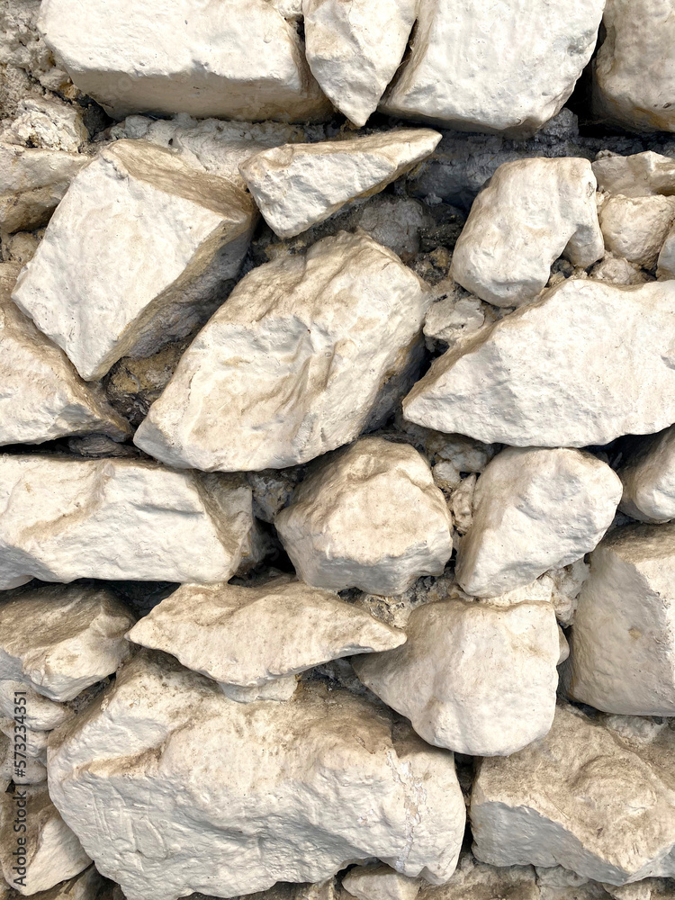 Coarse natural rock, Stone background. Mining cliff rough front surface. Coarse natural rock, Stone background. Mining cliff rough front surface.