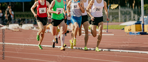 group male runners running middle distance race photo