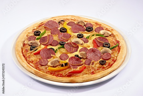 Pizza pepperoni, mushroom, and vegetables on white dish and isolated background