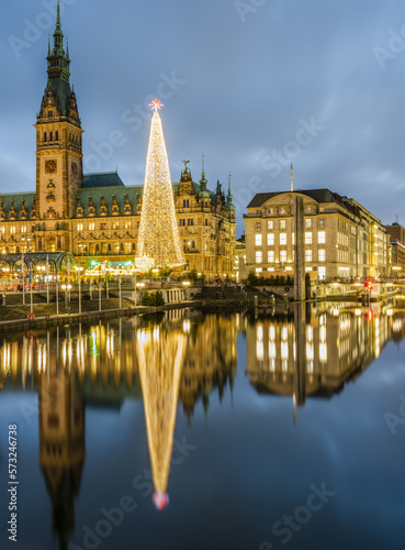 Rathaus hamburg, huge Christmas tree and lights reflection on Kleine Alster