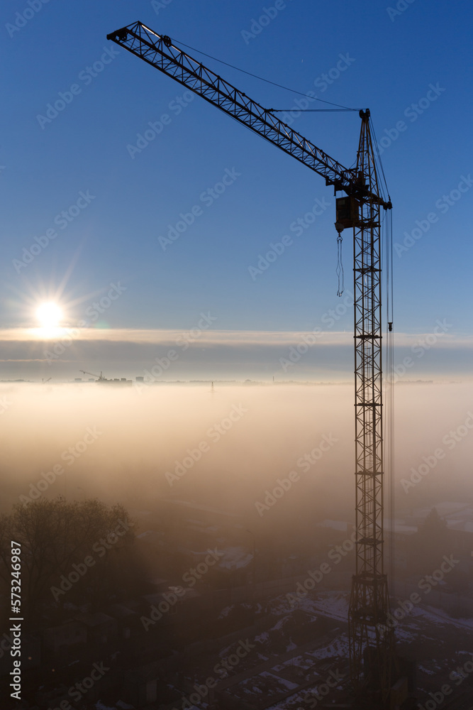 Construction Crane foggy morning Vancouver