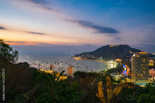 Vung Tau city aerial view at night with the most beautiful sea waves, coastline. Vung Tau is the capital of the province since the province's founding and is the crude oil extraction center of Vietnam