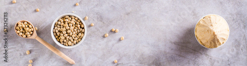 Traditional fermented soy miso seasoning in a bowl on the table. Japanese food. Top view. Web banner