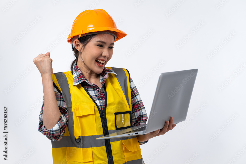 Happy Asian woman engineer and safety helmet with laptop isolated on white background. Happy Asian woman engineer and safety helmet with laptop isolated on white background.