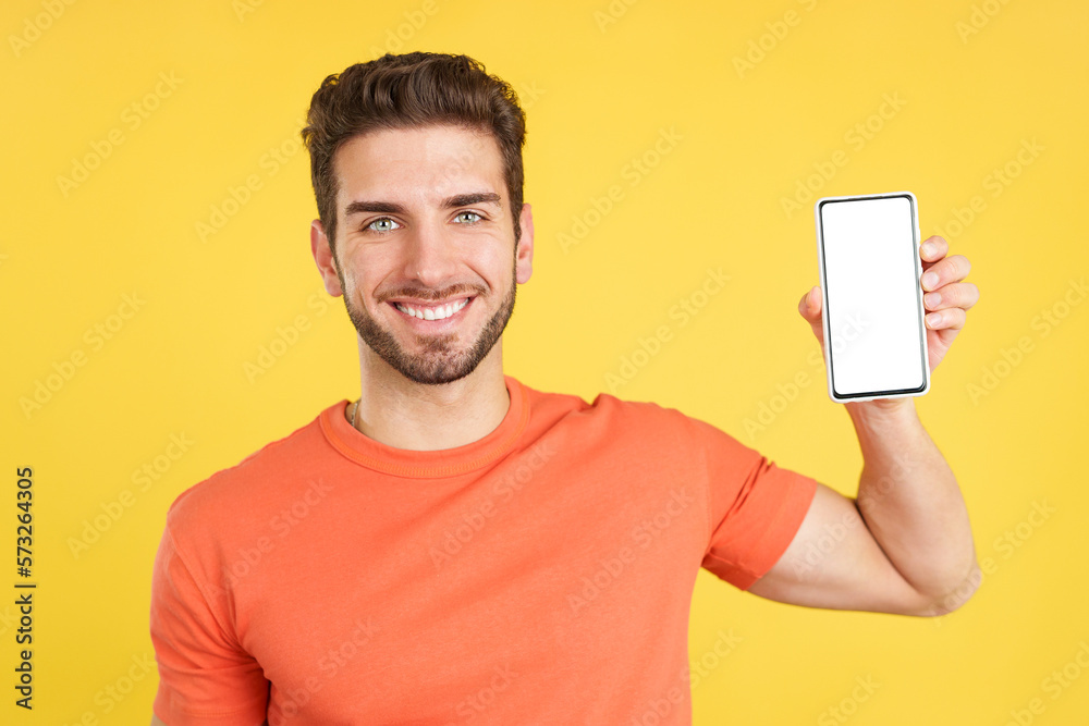 Happy man holding a mobile with a blank screen Happy man holding a mobile with a blank screen
