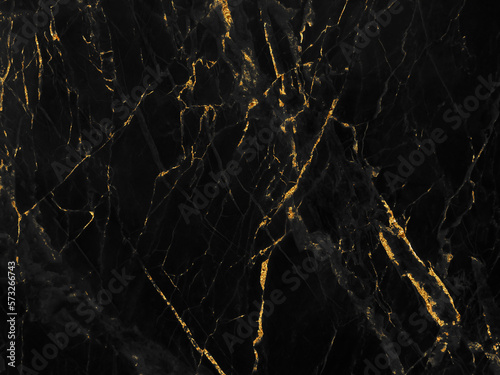 Black and gold marble luxury wall texture with shiny golden line pattern abstract background design for a cover book or wallpaper and banner website.	
