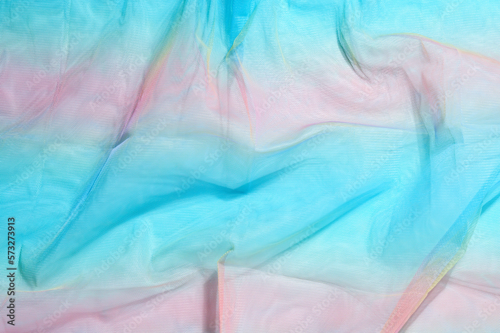 Fototapeta premium Silk fabric transparent. Blue pink red. twisted twirl fabric multicolour texture