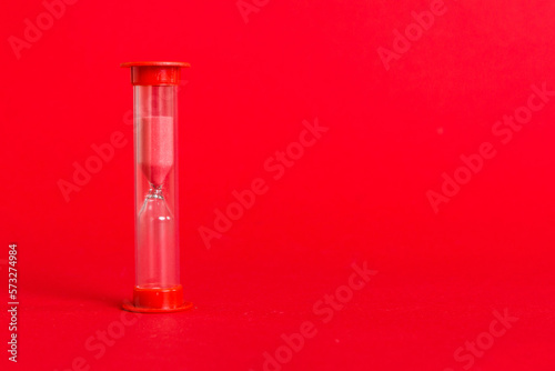hourglass on the table, sand clock as time passing concept for business deadline, copy space