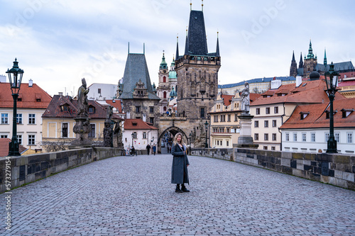 Photography Portrait of a young beautiful girl on the street in Prague.