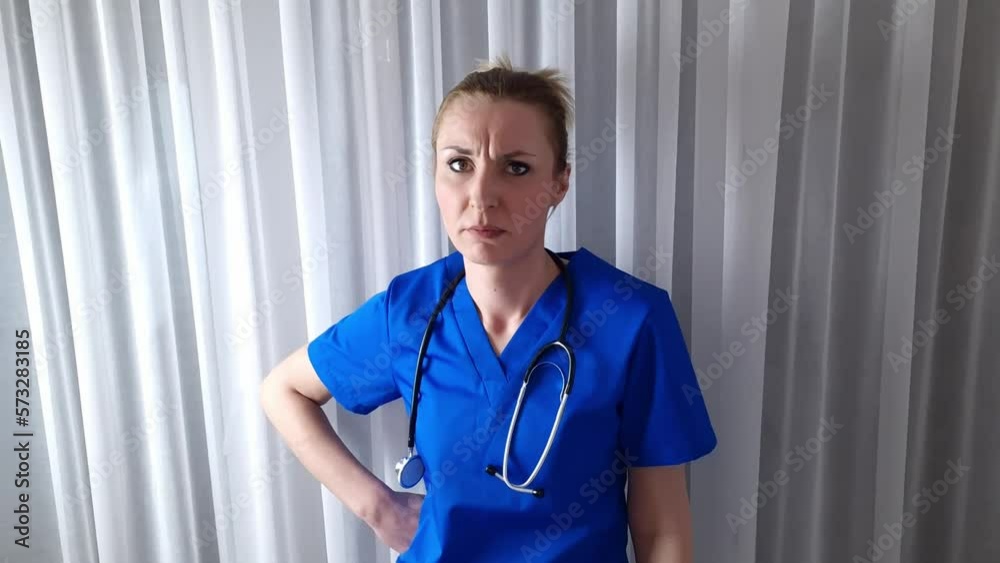 Sad tired stressed female doctor at office. Health care and medicine concept Sad tired stressed female doctor at office. Health care and medicine concept