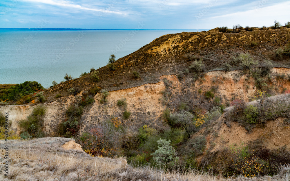 Clay shores of the Dniester estuary, steep with ravines, overgrown with wild steppe vegetation
