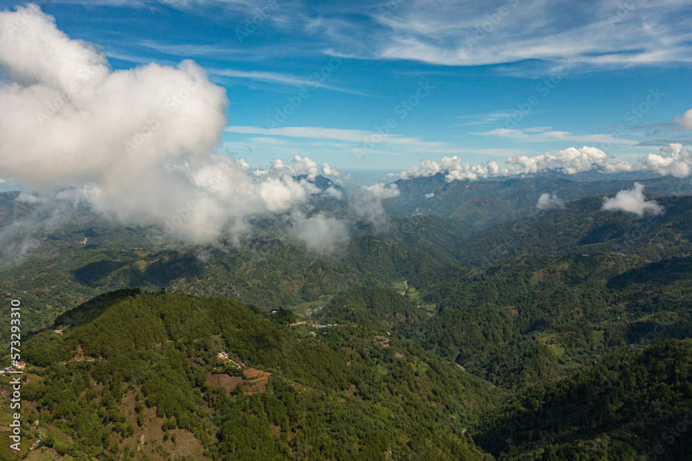 Aerial drone of mountain slopes covered with rainforest and jungle View from above. Philippines.