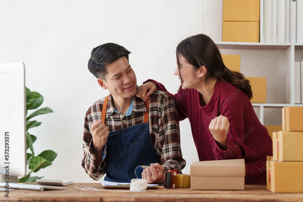 Asian couple doing business online. Entrepreneurs, small SME businesses concept. Asian couple doing business online. Entrepreneurs, small SME businesses concept.