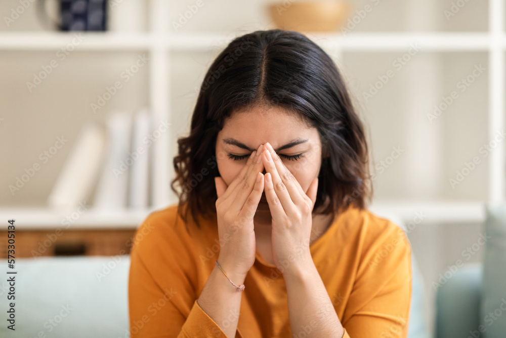 Closeup Portrait Of Young Arab Woman Crying At Home Closeup Portrait Of Young Arab Woman Crying At Home
